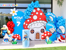 Smurfs birthday decorations with mushroom house and balloon arch